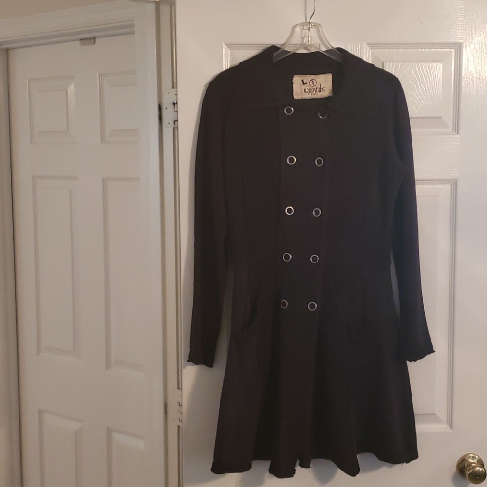 Long jacket that flairs out on the bottom like a d